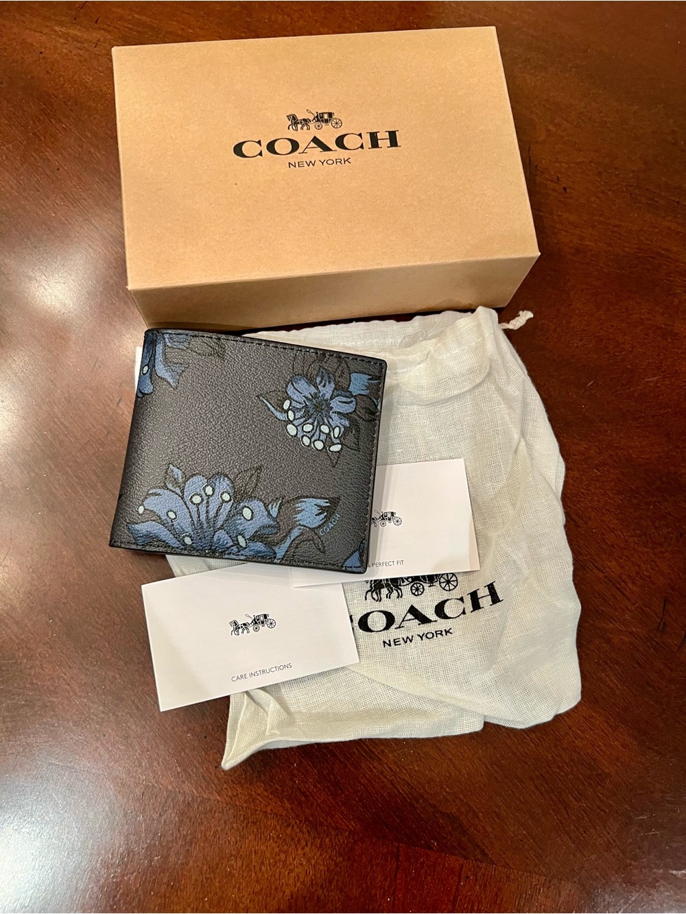Coach Black Leather Bifold Card Holder with Blue Floral Print